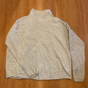 half turtle neck sweater